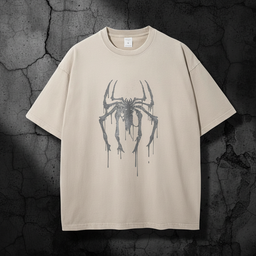Beige t-shirt with distressed spider on dark background