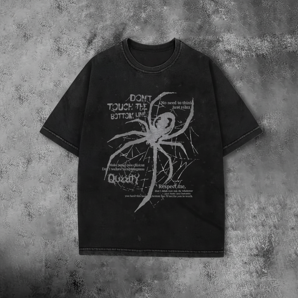 Black oversized t-shirt with spider graphic on dark background