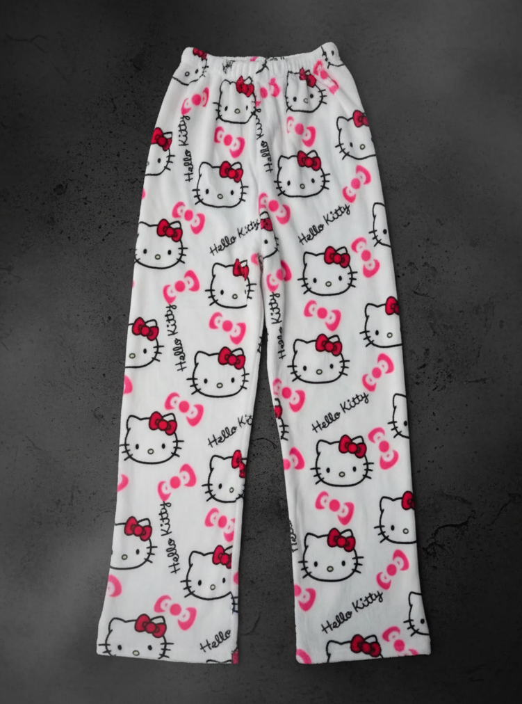 White Hello Kitty pyjama bottoms on dark background